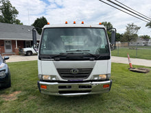 2006 UD 2000 Rollback — Fleet Retirement
