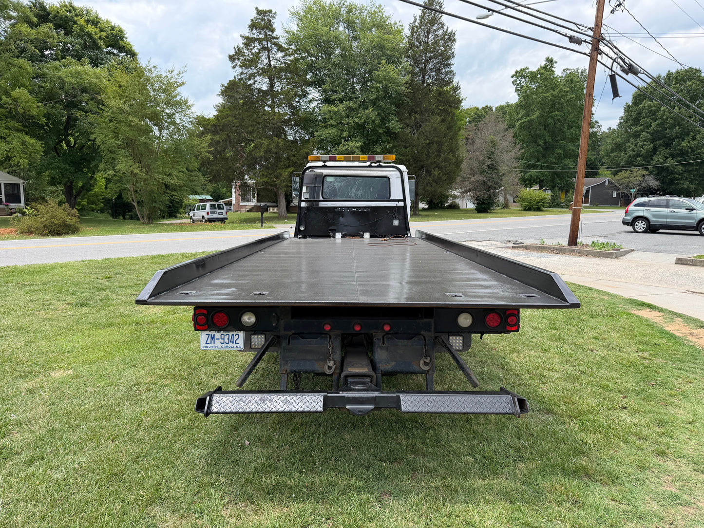 2004 UD 2000 Rollback — Fleet Retirement