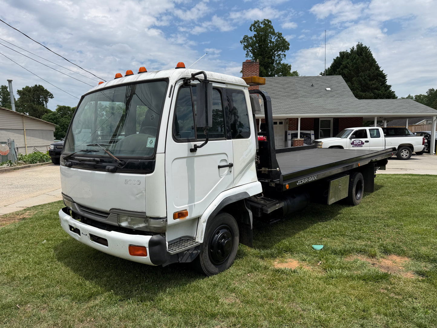 2004 UD 2000 Rollback — Fleet Retirement