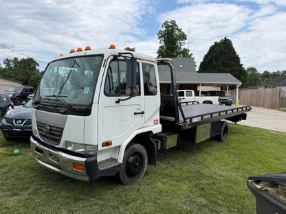 2006 UD 2000 Rollback — Fleet Retirement